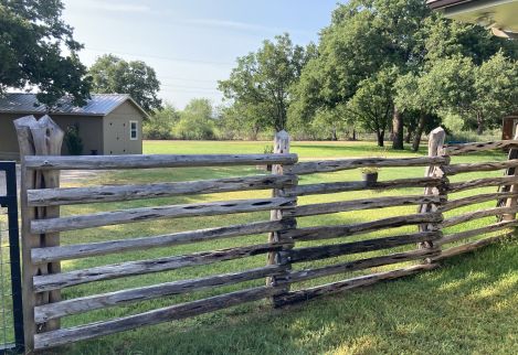 One of our signature fences uses cedar posts that we have hewn down to pure heart to last generations!